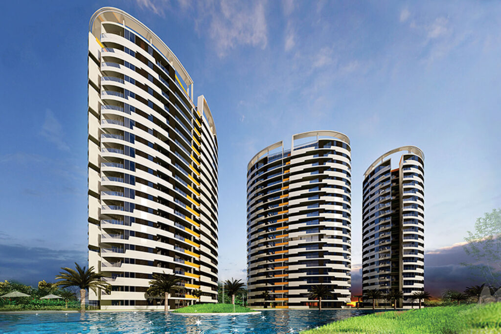 Omaxe residential project showcasing modern architecture and landscaped surroundings, offering premium flats in New Chandigarh.